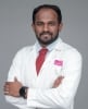 Dr. KAVIN S