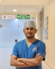 Dr. Kishore H