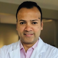 Dr. Malay Shukla